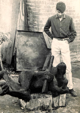 Omasr Badsha viewing Dumile's sculpture "Chameleon" in Plaster of Paris, in Durban 1966